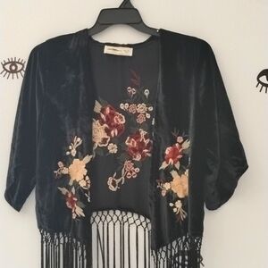 Dainty and elegant velvet overlay jacket. Fun fringe and blossoms.
